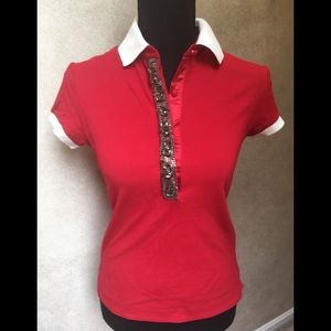 Red polo shirt with smoke stones